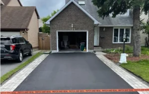 Coquitlam, Vancouver asphalt driveway replacement with brick accents project